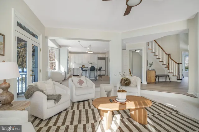 a white toilet sitting next to a bathroom sink