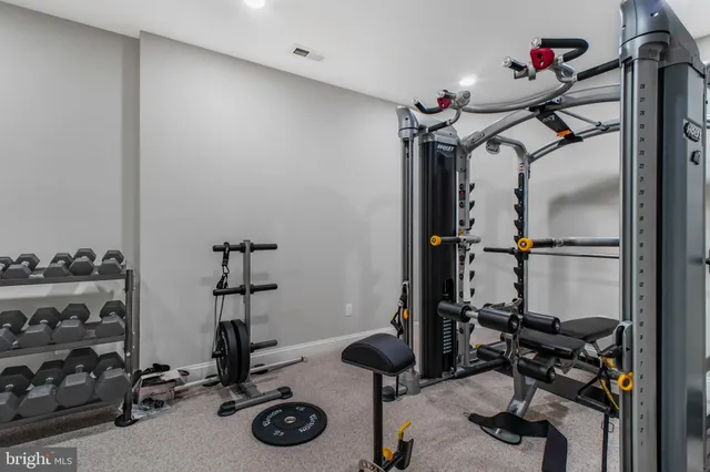 a white toilet sitting next to a bathroom sink