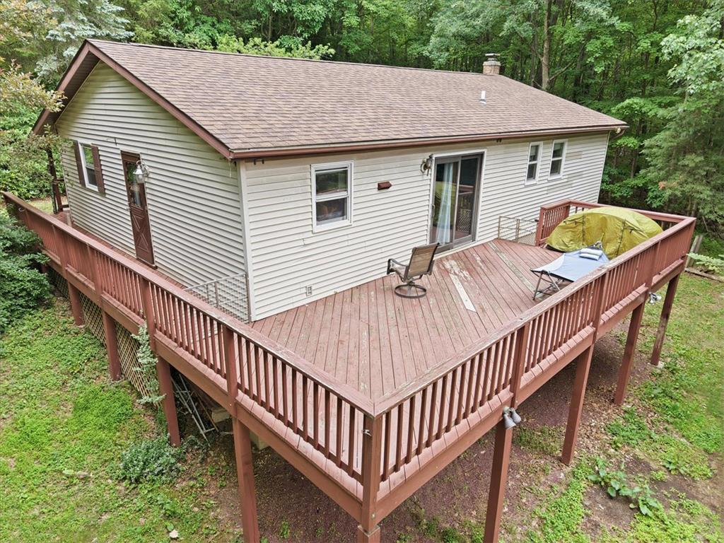 520 Highland Hill Road Jim Thorpe, PA 18235 - Photo 52 of 83 A spacious elevated deck extends living space into the surrounding natural landscape.