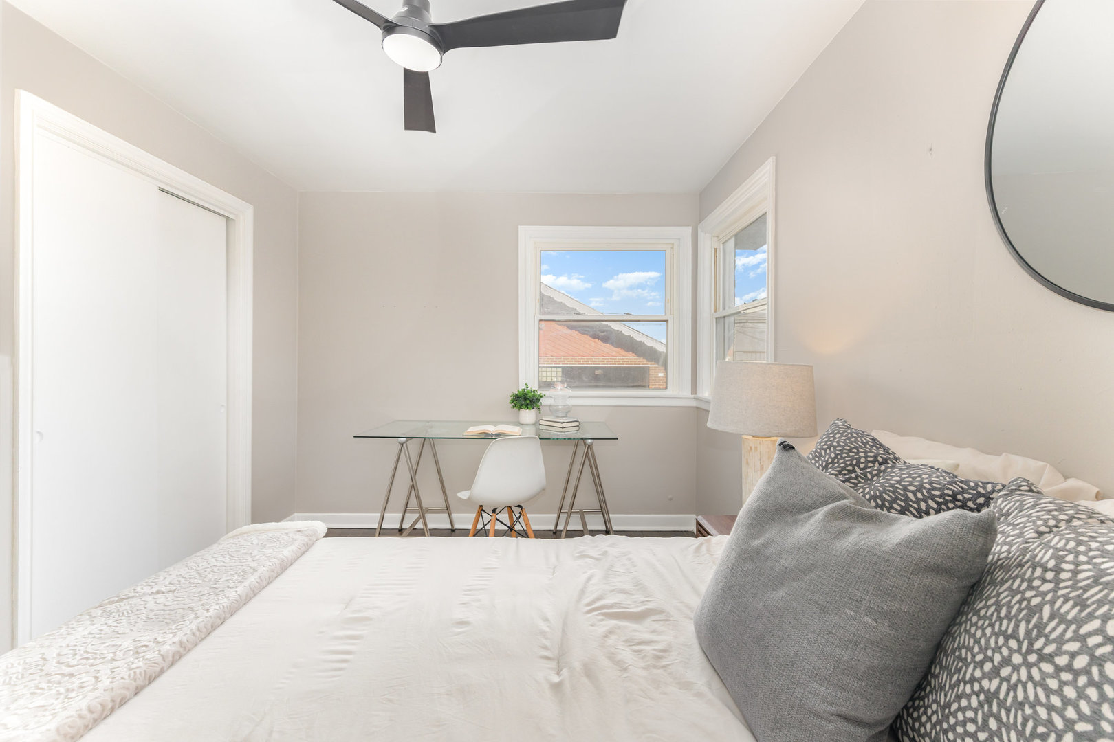 4852 West Hirsch Street Chicago, IL 60651 - Photo 14 of 38 a bedroom with a bed and a window