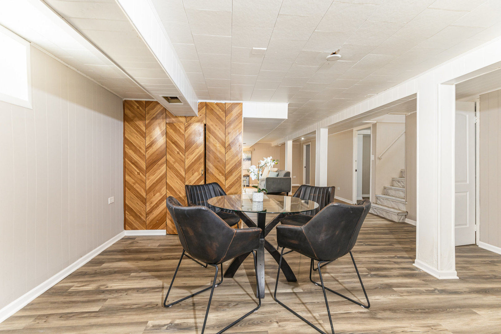 4852 West Hirsch Street Chicago, IL 60651 - Photo 22 of 38 a dining room with furniture and wooden floor