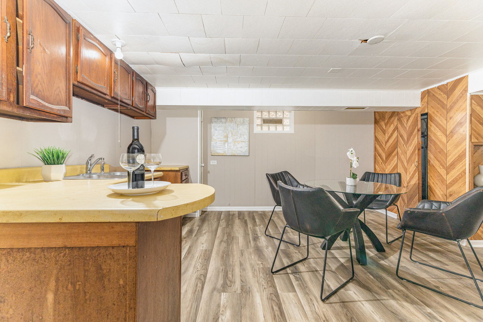 4852 West Hirsch Street Chicago, IL 60651 - Photo 23 of 38 a view of a dining room with furniture and wooden floor