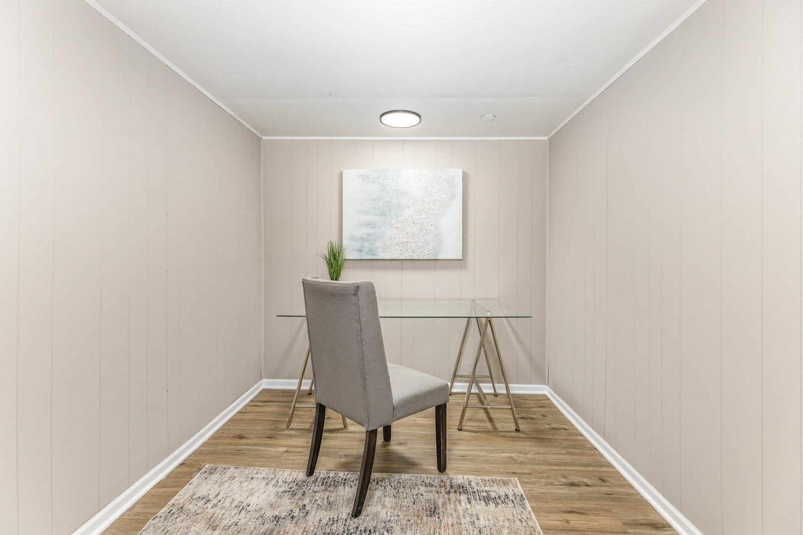 4852 West Hirsch Street Chicago, IL 60651 - Photo 25 of 38 a view of a workspace with furniture and wooden floor