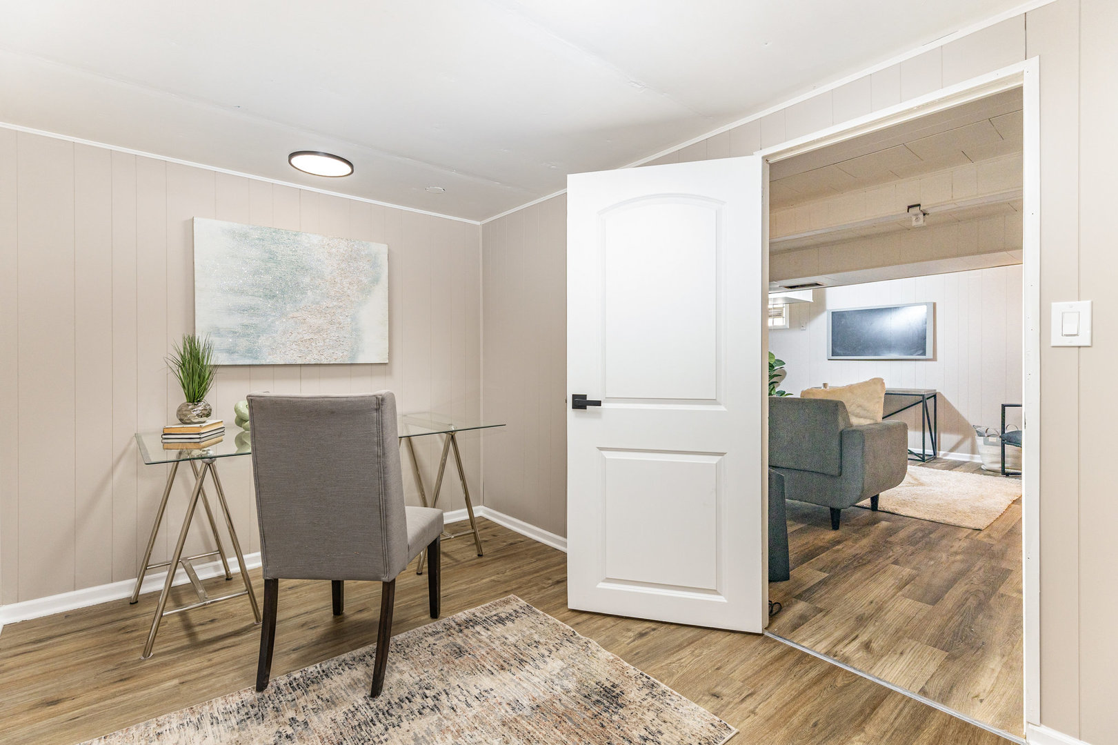 4852 West Hirsch Street Chicago, IL 60651 - Photo 26 of 38 a workspace with furniture and wooden floor