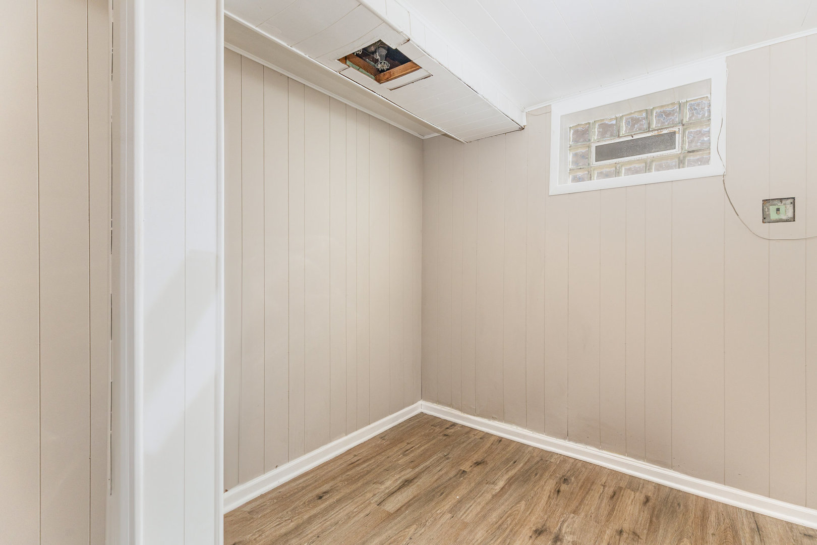 4852 West Hirsch Street Chicago, IL 60651 - Photo 30 of 38 a view of a hallway with wooden floor