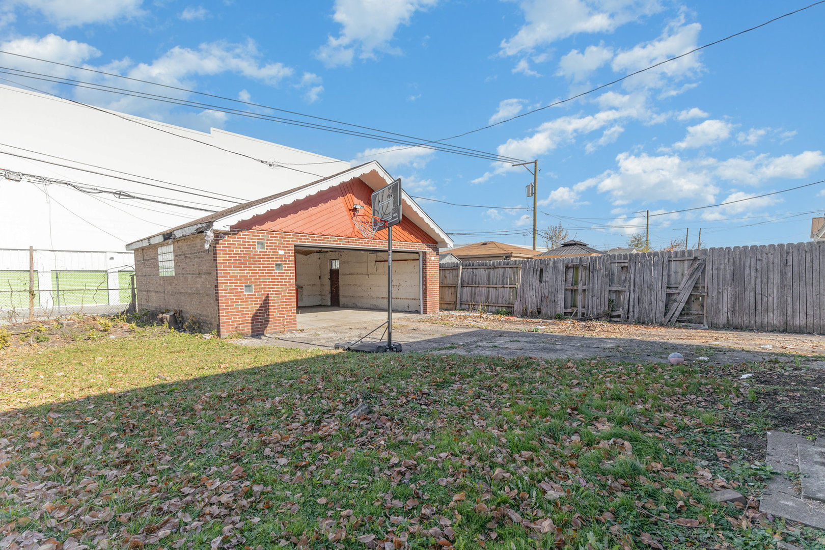 4852 West Hirsch Street Chicago, IL 60651 - Photo 34 of 38 a house view with a backyard space