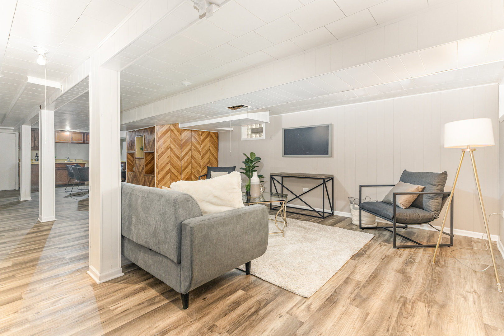 4852 West Hirsch Street Chicago, IL 60651 - Photo 8 of 38 a living room with furniture and a wooden floor