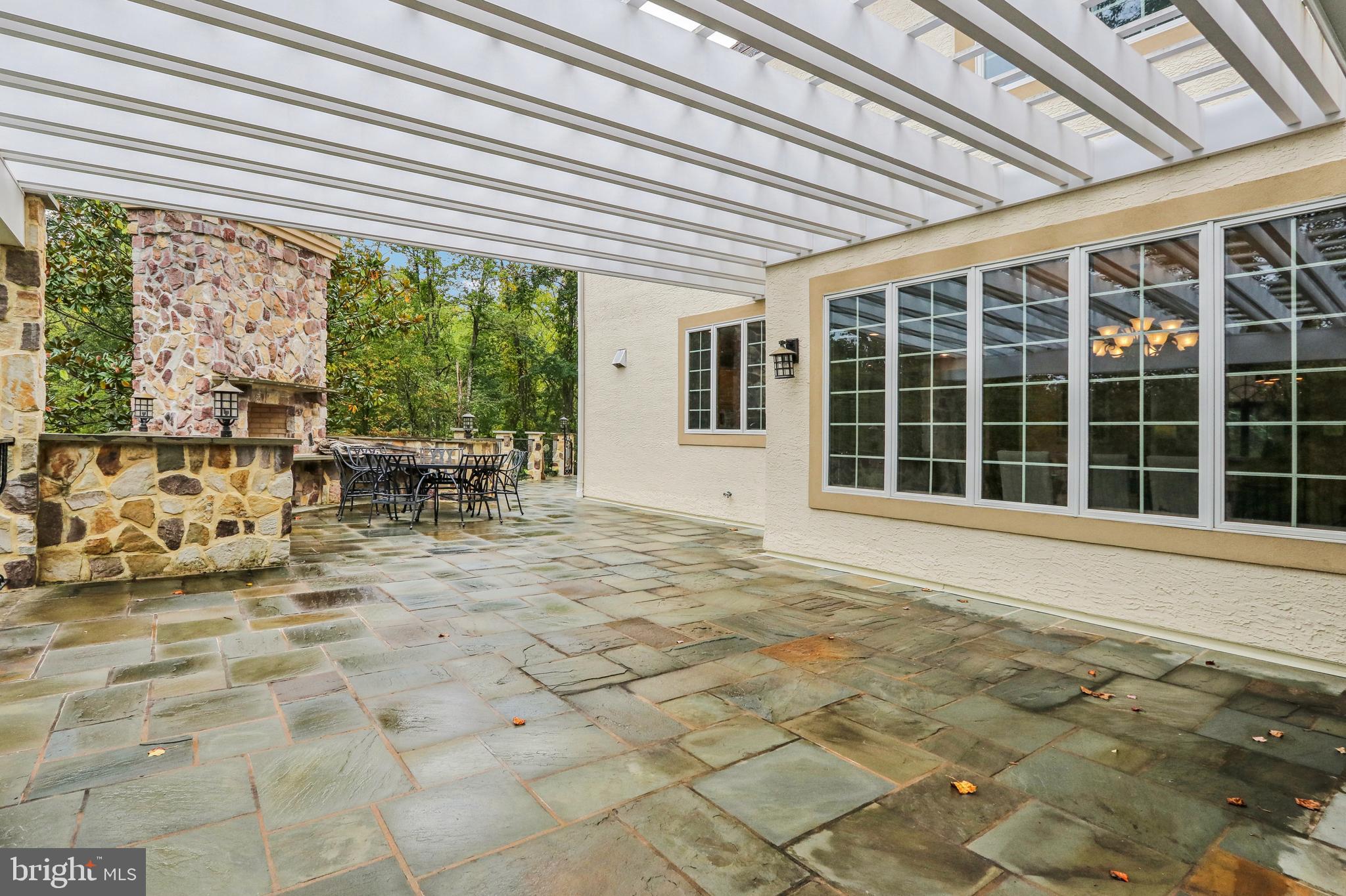 6007 Goshen Road Newtown Square, PA 19073 - Photo 63 of 73 Flag stone deck off of entire back of home