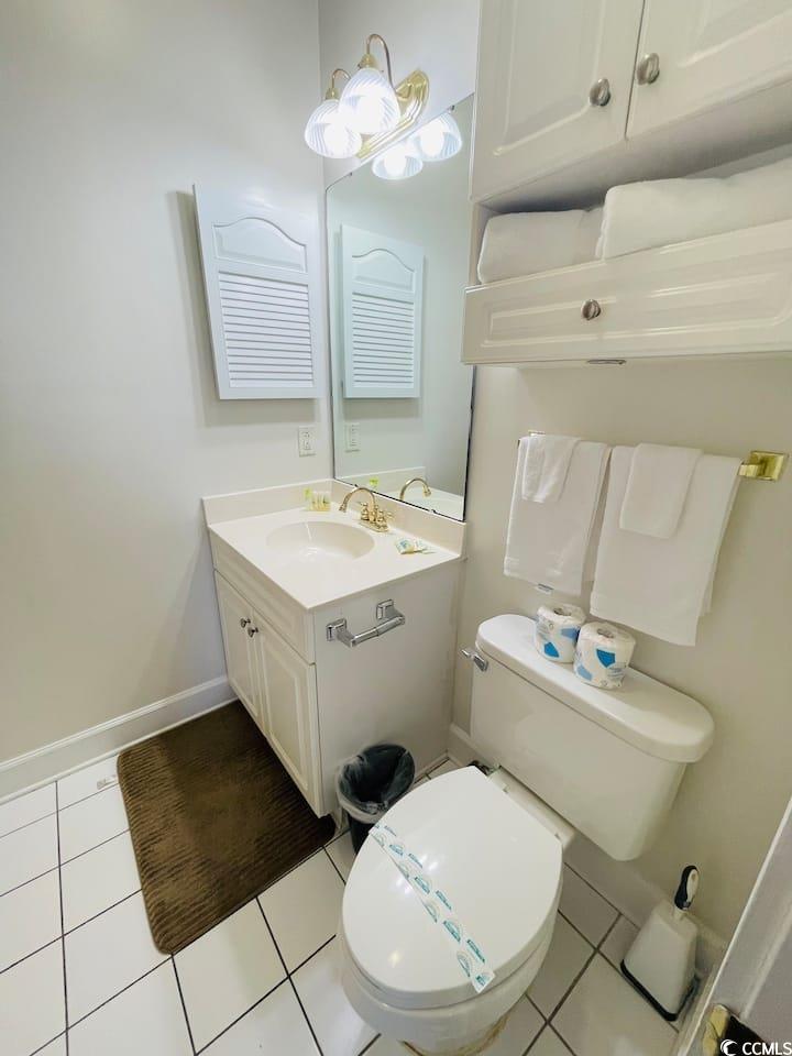 4631 Wild Iris Drive, Unit 301 Myrtle Beach, SC 29577 - Photo 21 of 37 Bathroom featuring vanity and light tile patterned flooring