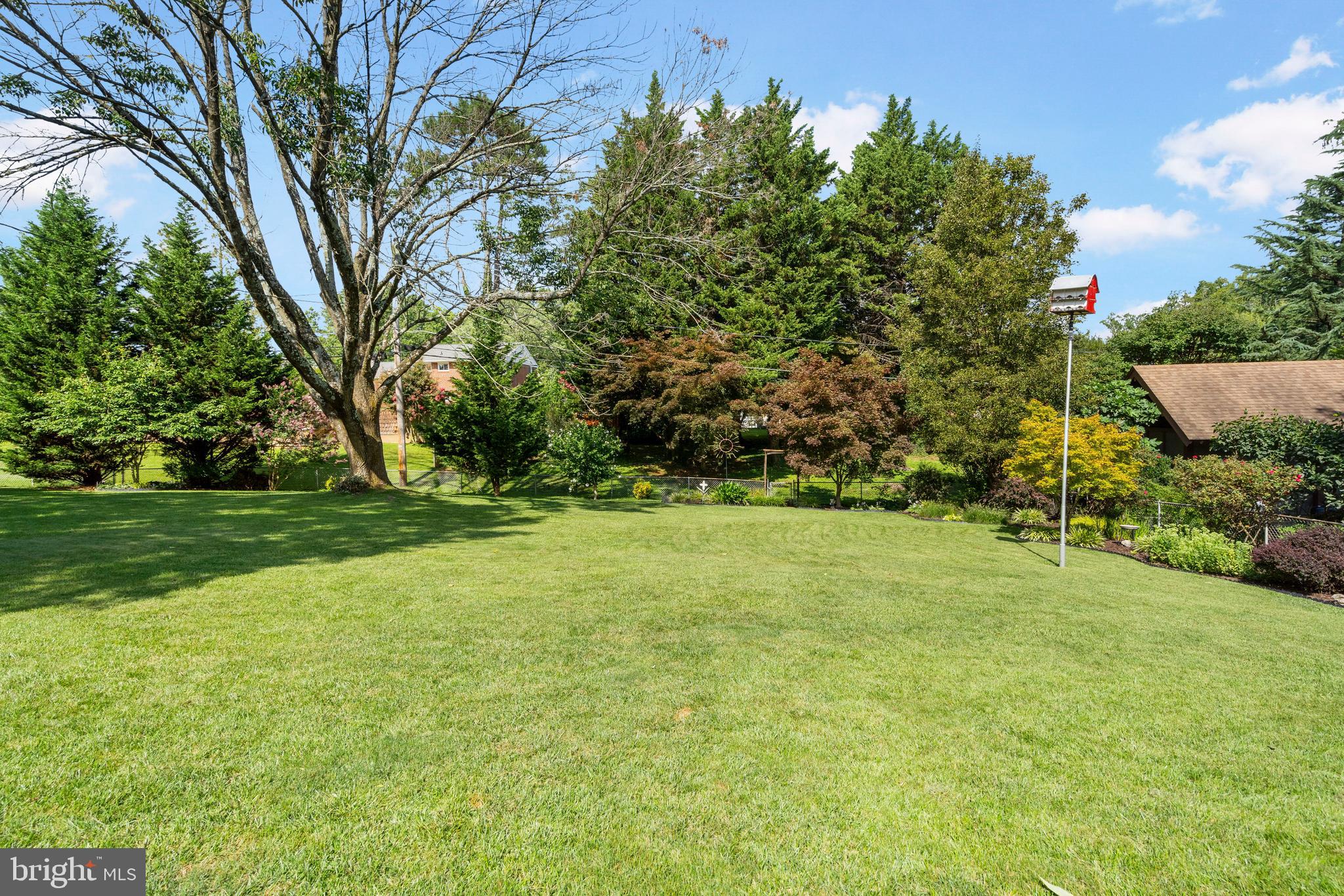 1210 Dulaney Valley Road Towson, MD 21286 - Photo 27 of 32 Beautiful Trees Flank the Yard