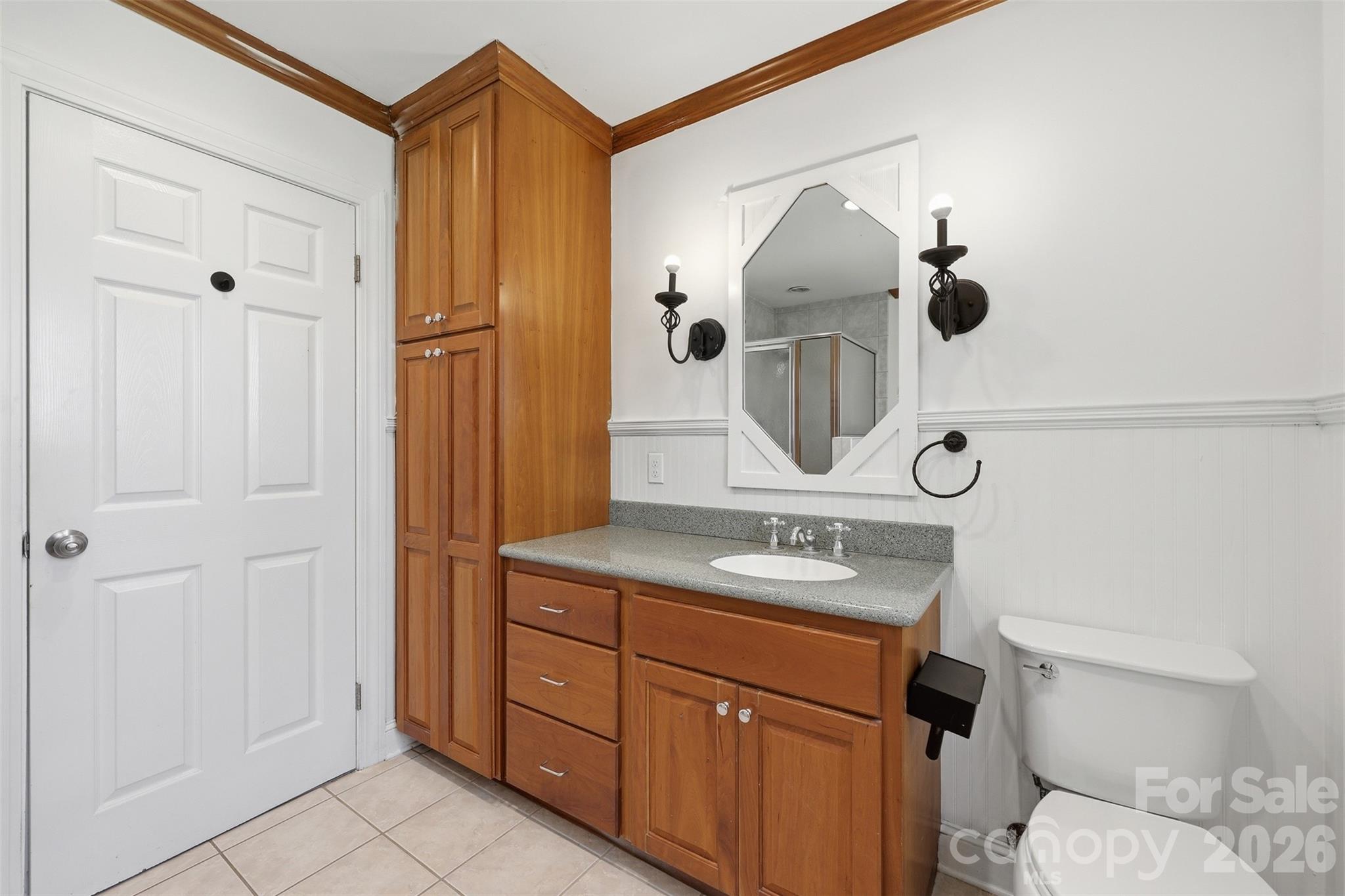 4920 Bright Road Charlotte, NC 28214 - Photo 15 of 46 a bathroom with a sink and a mirror