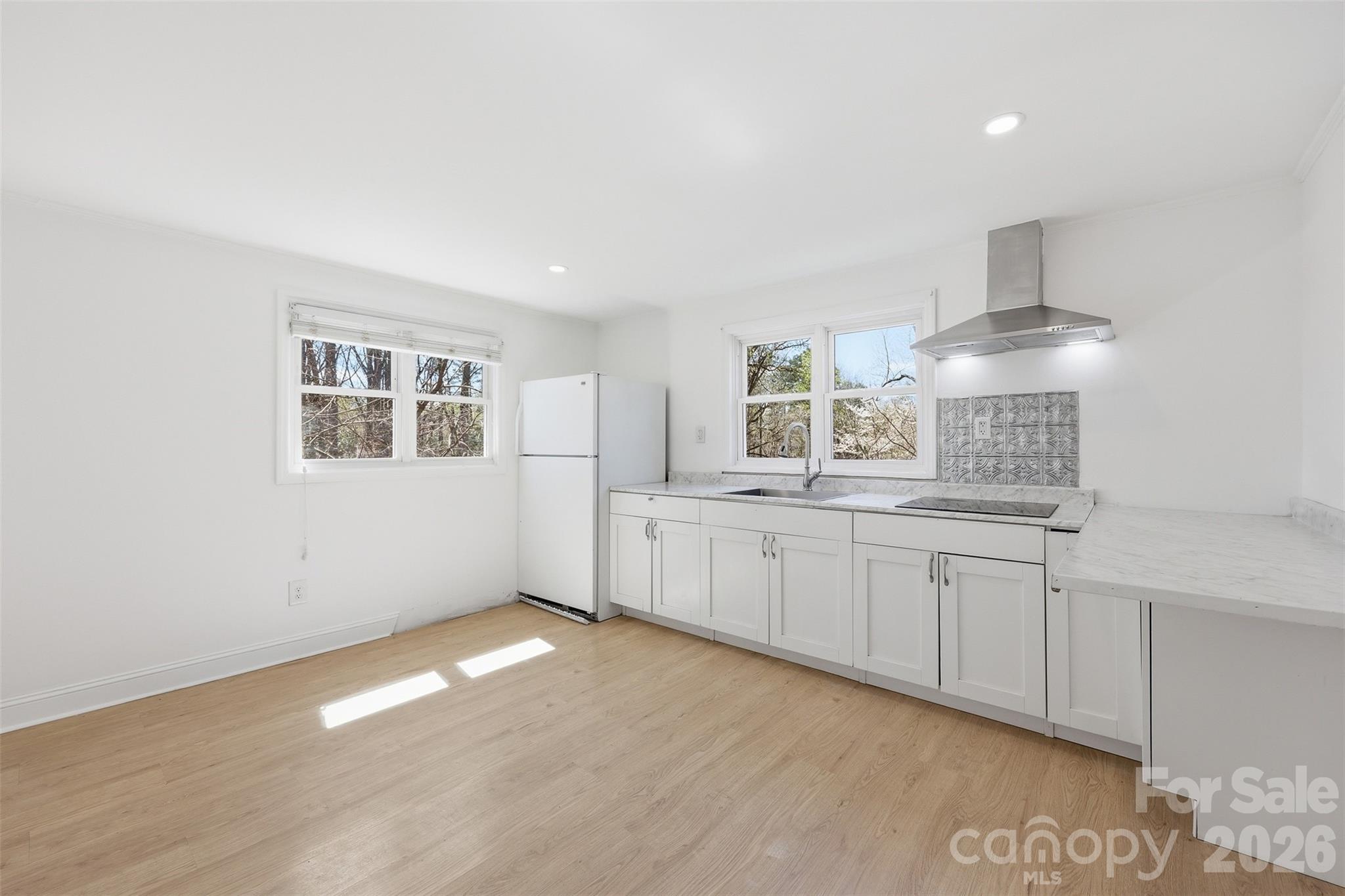 4920 Bright Road Charlotte, NC 28214 - Photo 26 of 46 a kitchen with granite countertop a stove and a sink