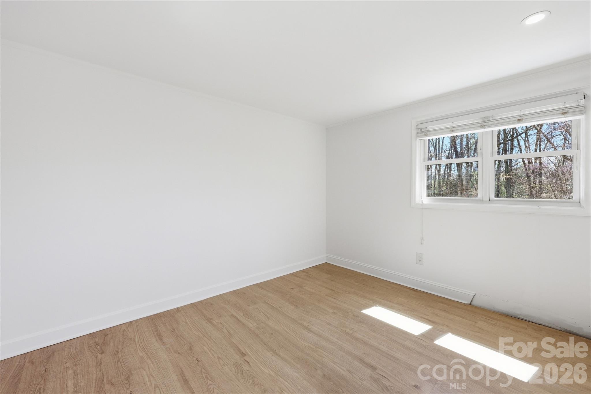 4920 Bright Road Charlotte, NC 28214 - Photo 29 of 46 an empty room with a window
