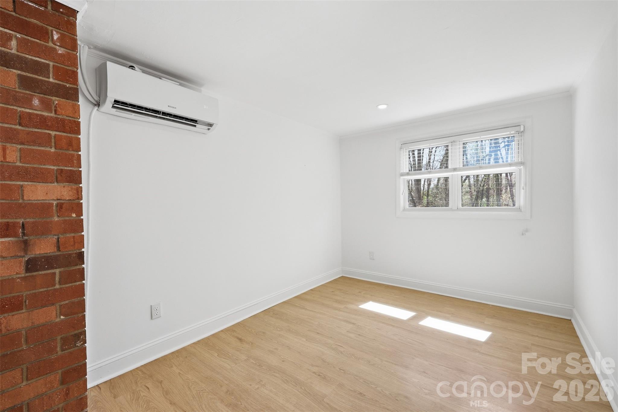 4920 Bright Road Charlotte, NC 28214 - Photo 31 of 46 a view of empty room with windows