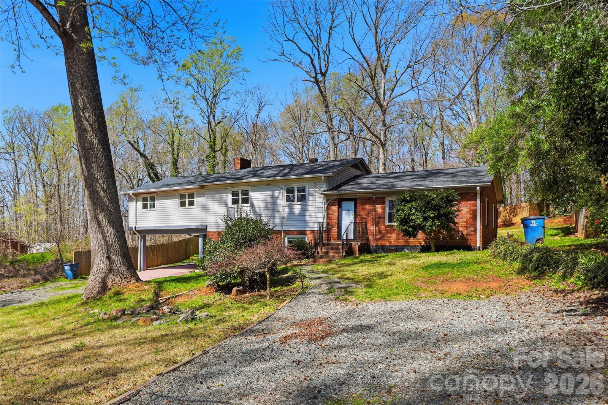 4920 Bright Road Charlotte, NC 28214 - Photo 34 of 46 a view of a house with a yard and sitting area