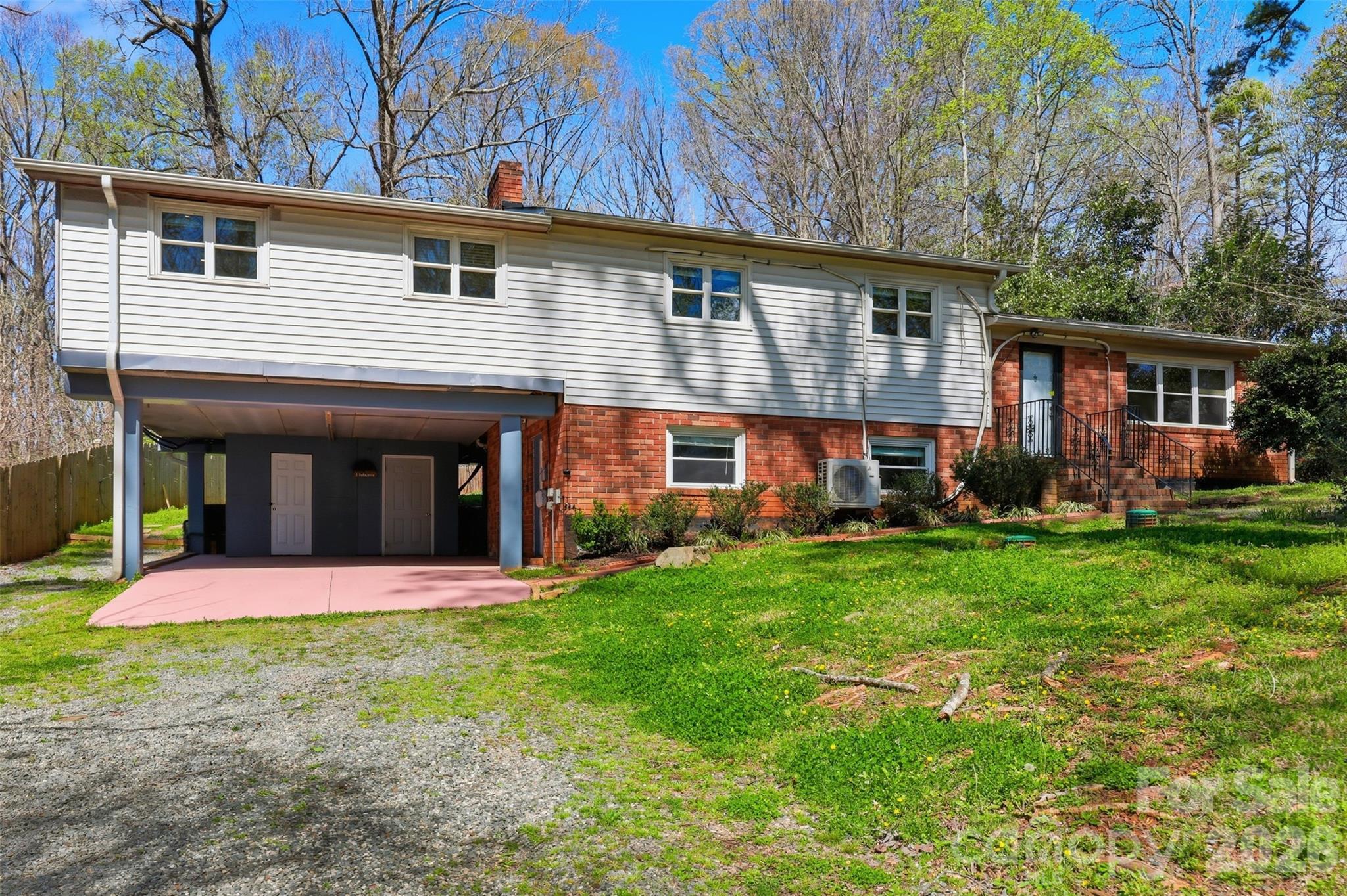 4920 Bright Road Charlotte, NC 28214 - Photo 37 of 46 front view of a house with a yard