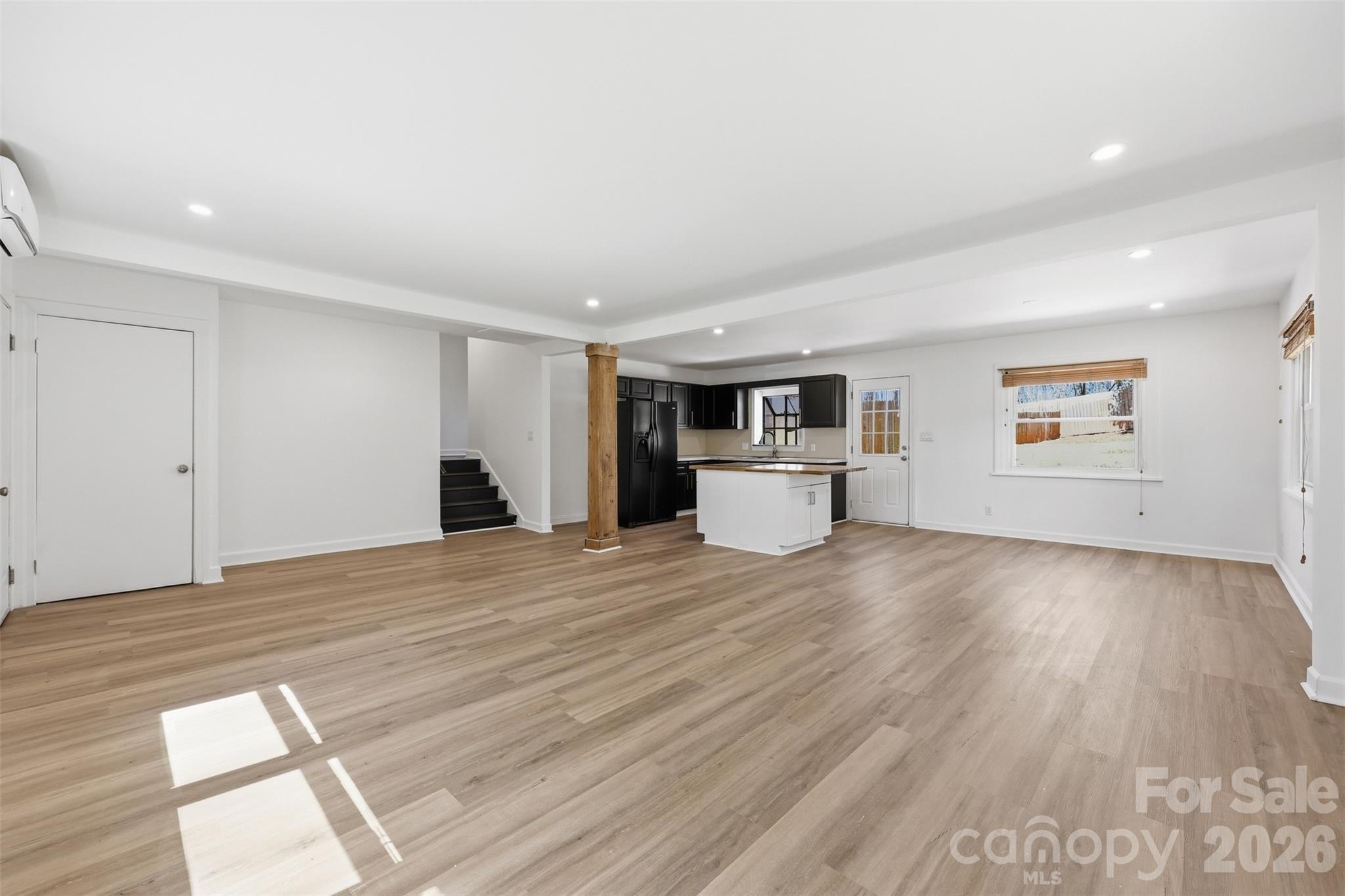 4920 Bright Road Charlotte, NC 28214 - Photo 4 of 46 a view of kitchen with a sink and a refrigerator