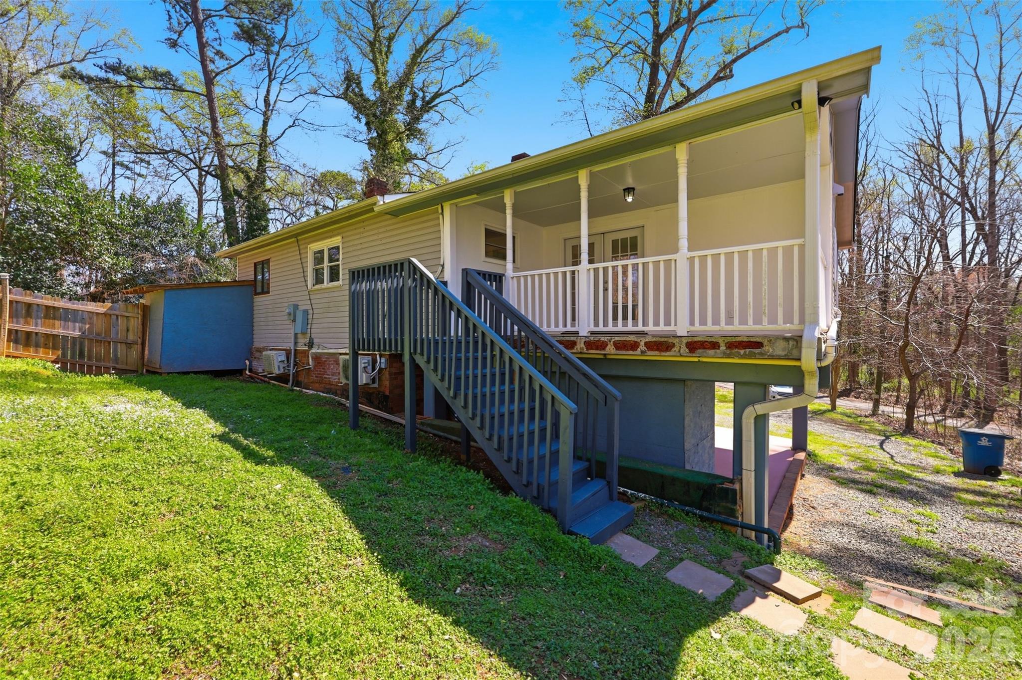 4920 Bright Road Charlotte, NC 28214 - Photo 41 of 46 a view of backyard with deck and garden