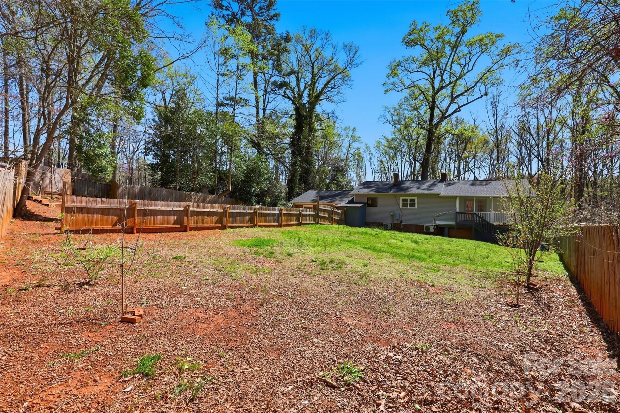 4920 Bright Road Charlotte, NC 28214 - Photo 43 of 46 a view of a yard with large trees