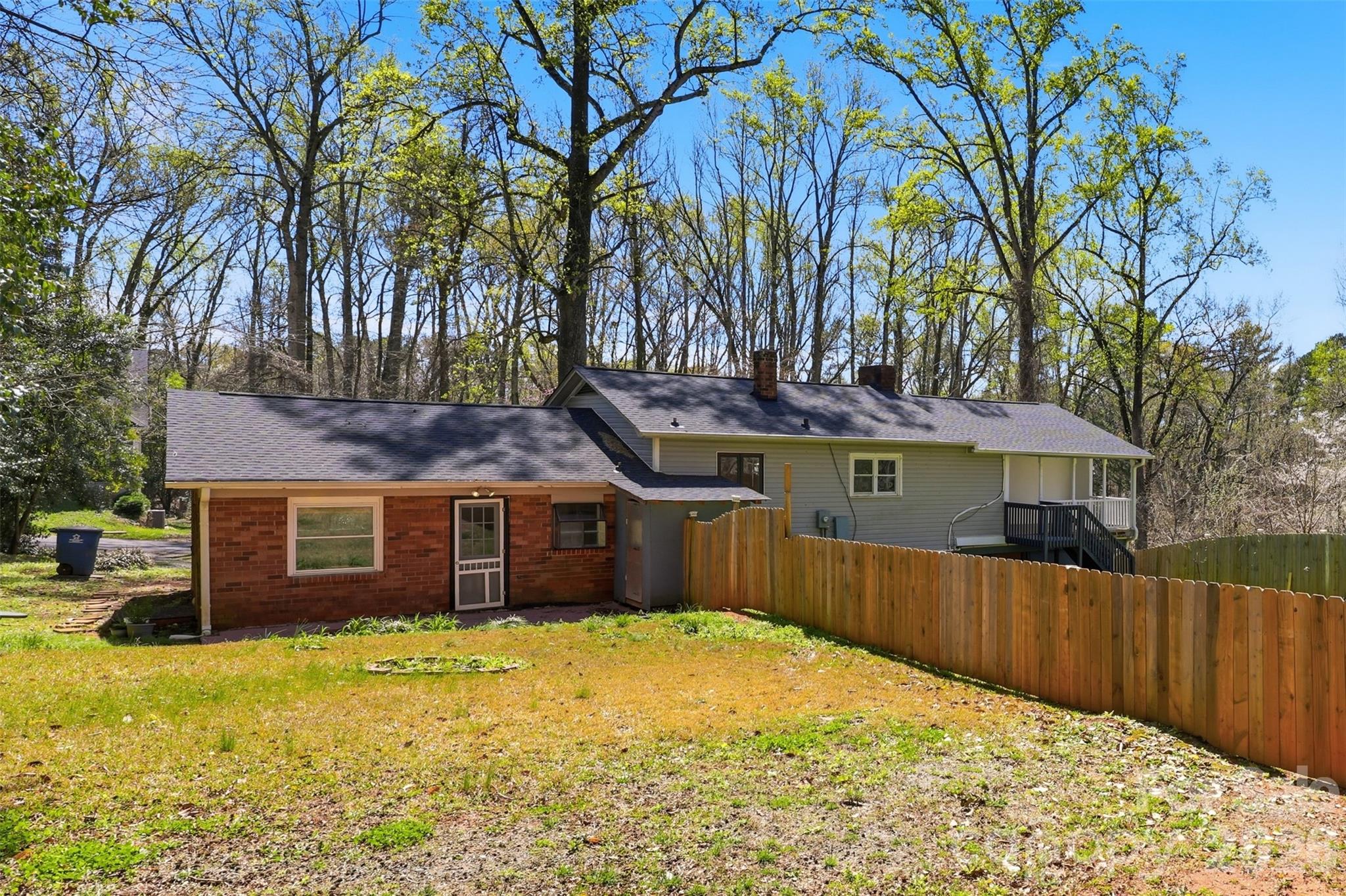 4920 Bright Road Charlotte, NC 28214 - Photo 44 of 46 a front view of a house with a yard and garage