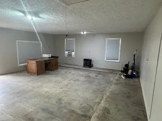 a backyard of a house with a yard and garage