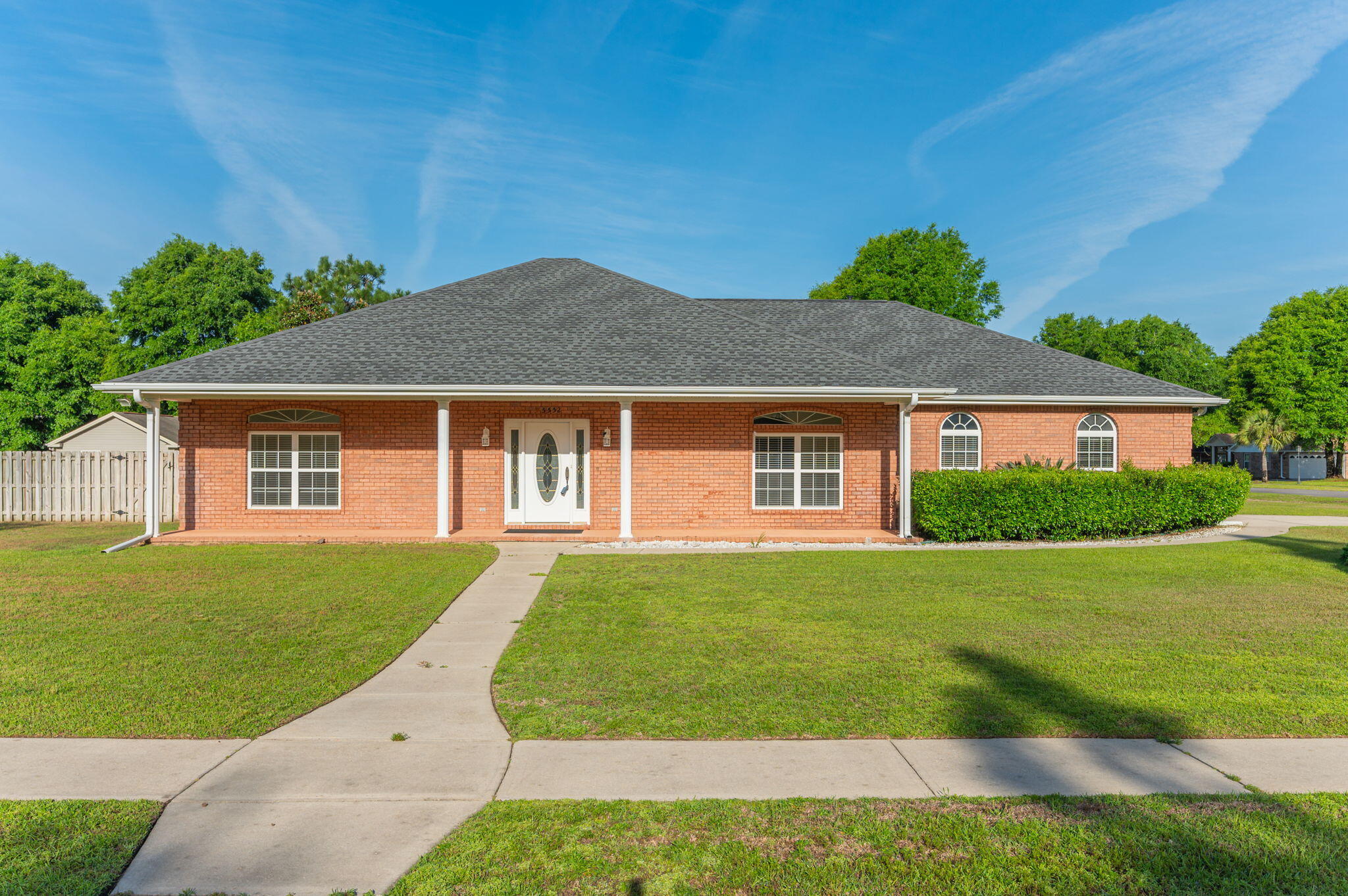 5552 Frontier Drive Crestview, FL 32536 - Photo 3 of 50 front view of a house with a yard