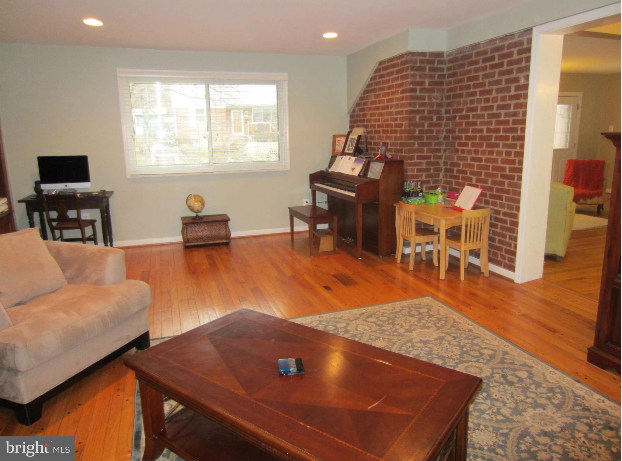 200 Marvin Road Silver Spring, MD 20901 - Photo 4 of 6 a living room with furniture pool table and a flat screen tv