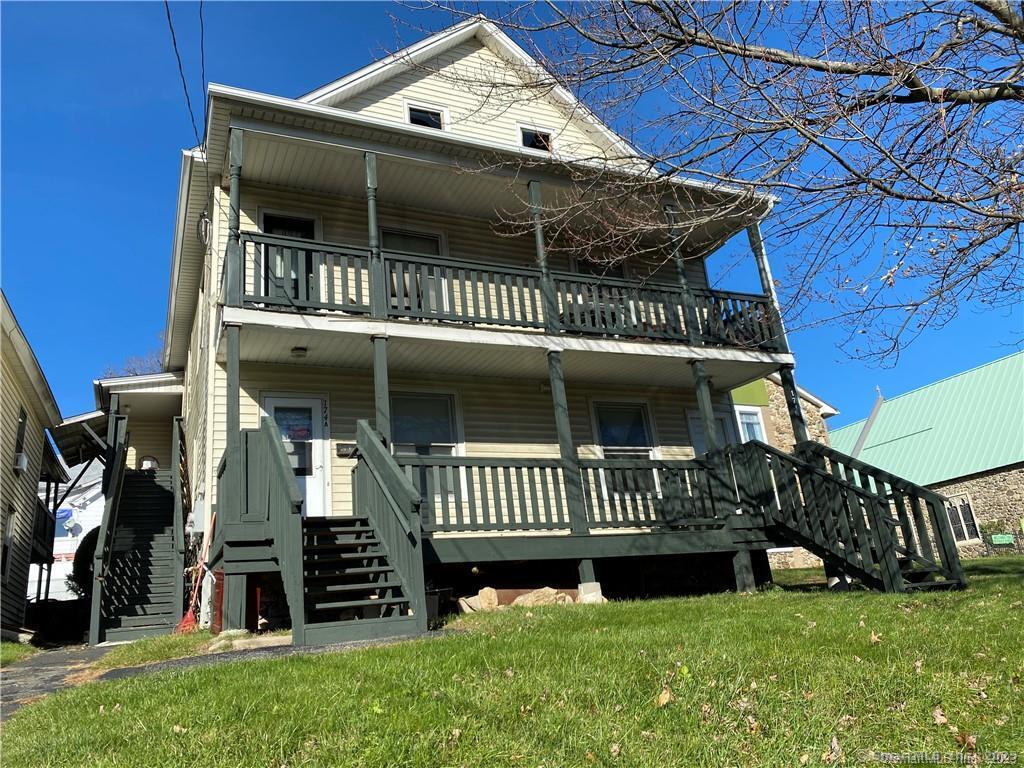 174 Main Street, Unit C Winchester, CT 06098 - Photo 1 of 1 a view of a house with a deck front of house