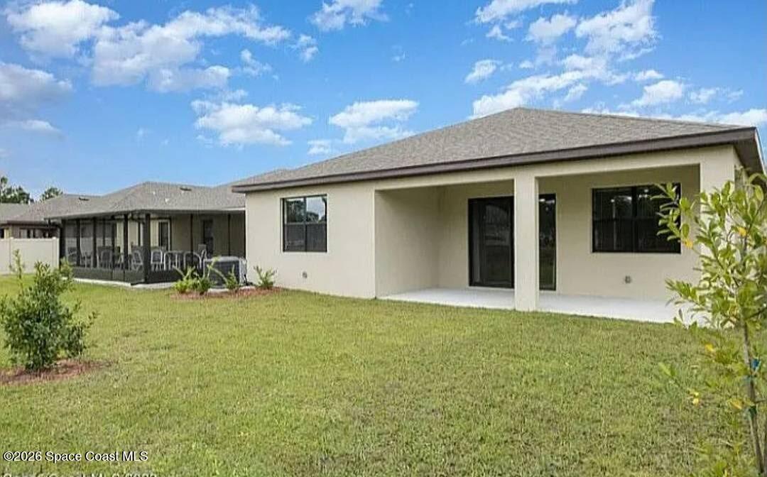 463 Old Country Rd S East Palm Bay, FL 32909 - Photo 8 of 9 Back of home