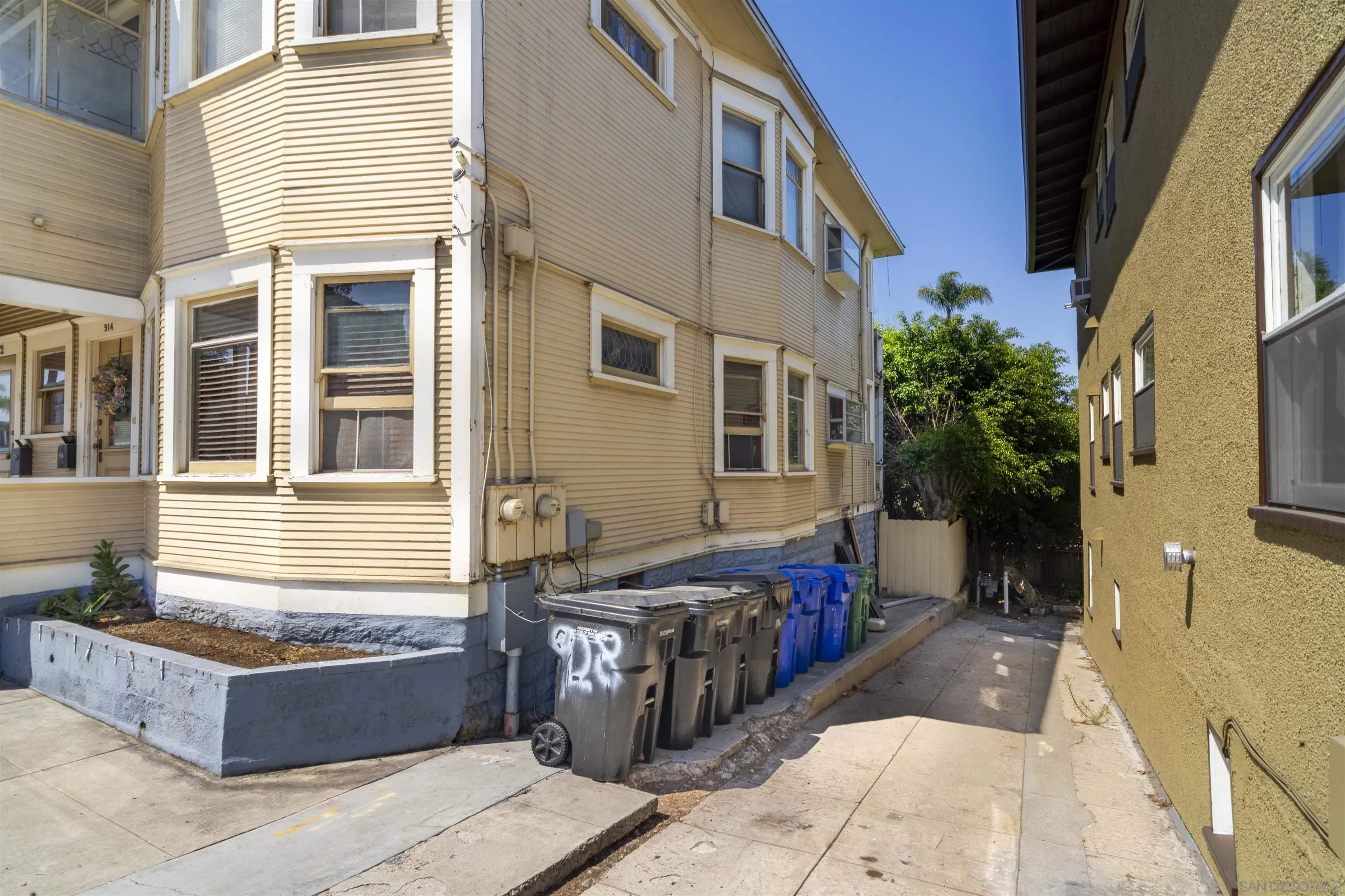 904-14 24th Street San Diego, CA 92102 - Photo 9 of 18 a view of a house with a barbeque and wooden stairs