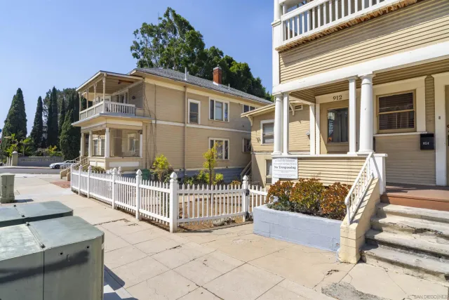 a front view of a house with a porch