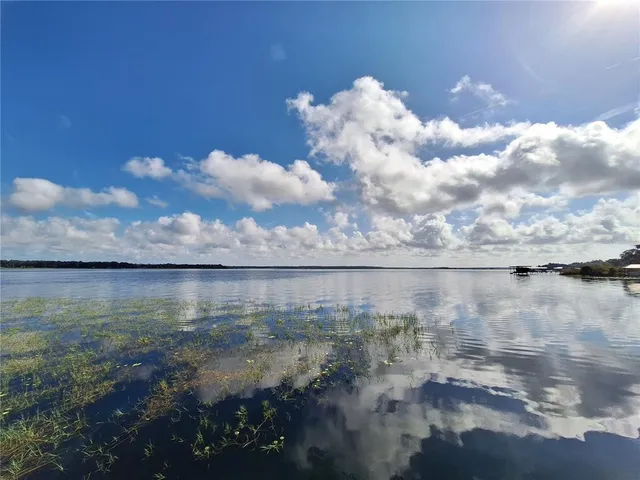a view of balcony with wooden floor