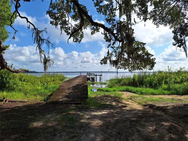 a view of a street in front of a house