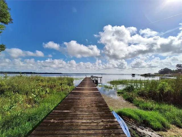 a view of a city street from a balcony