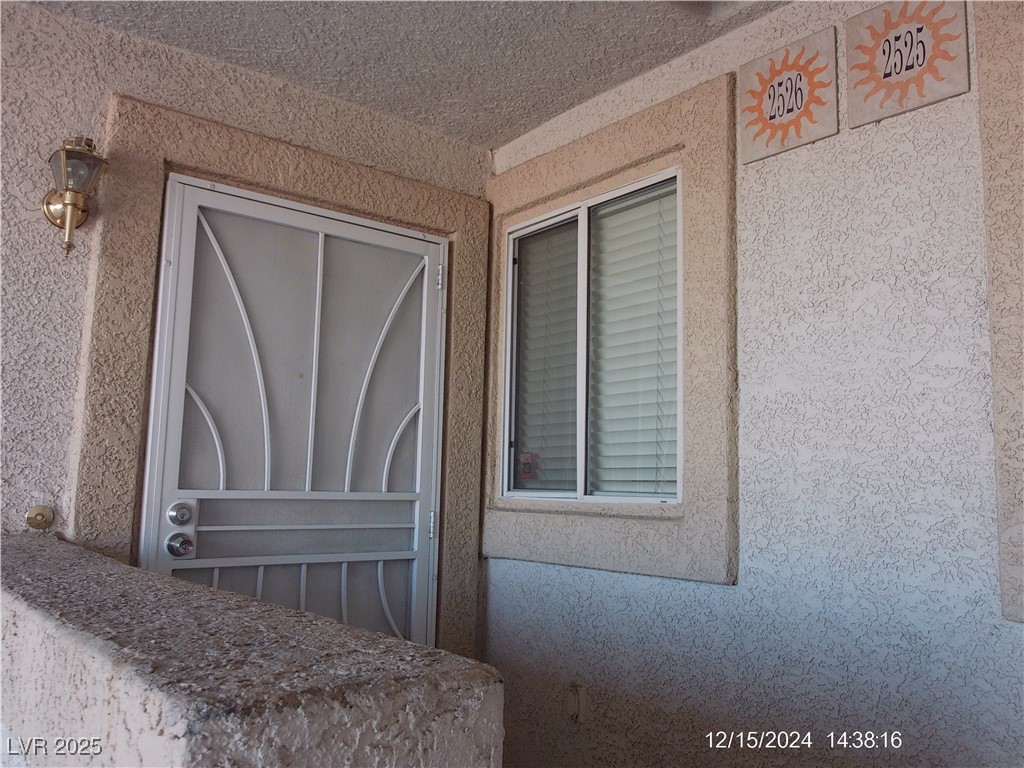 855 North Stephanie Street, Unit 2526 Henderson, NV 89014 - Photo 2 of 26 Exterior view of stucco siding