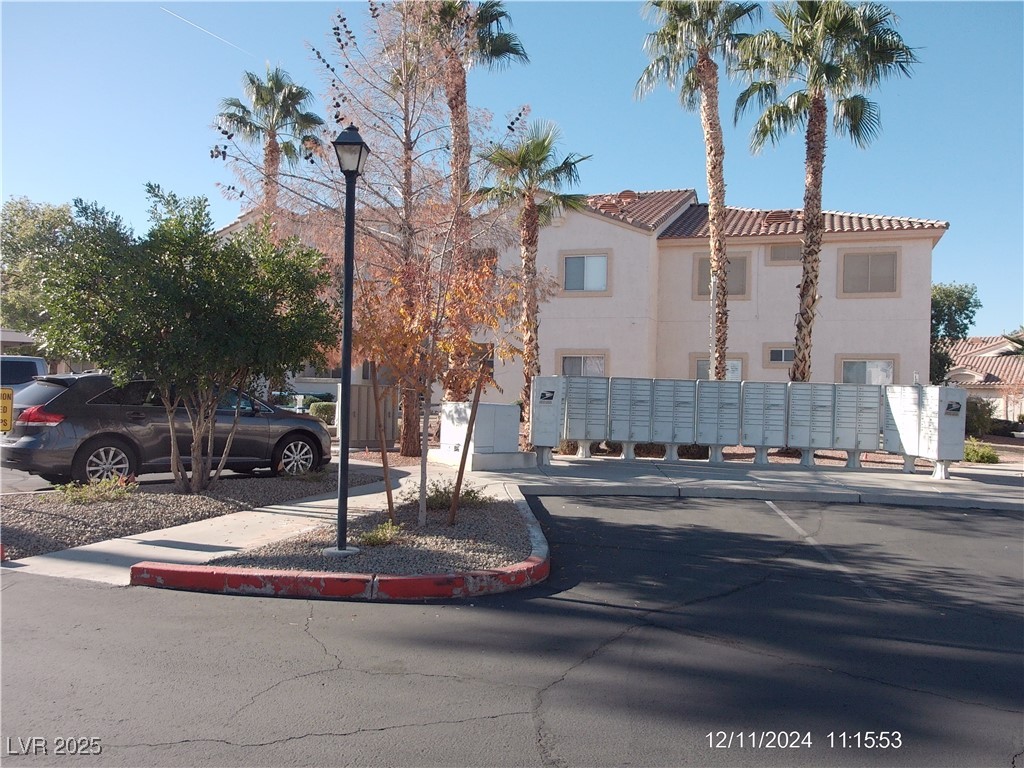 855 North Stephanie Street, Unit 2526 Henderson, NV 89014 - Photo 21 of 26 View of front of home featuring stucco siding and a tile roof