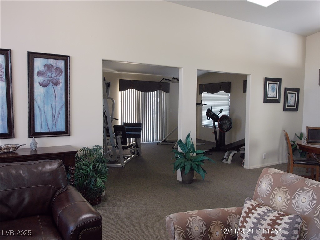 855 North Stephanie Street, Unit 2526 Henderson, NV 89014 - Photo 25 of 26 Living area with carpet floors and plenty of natural light