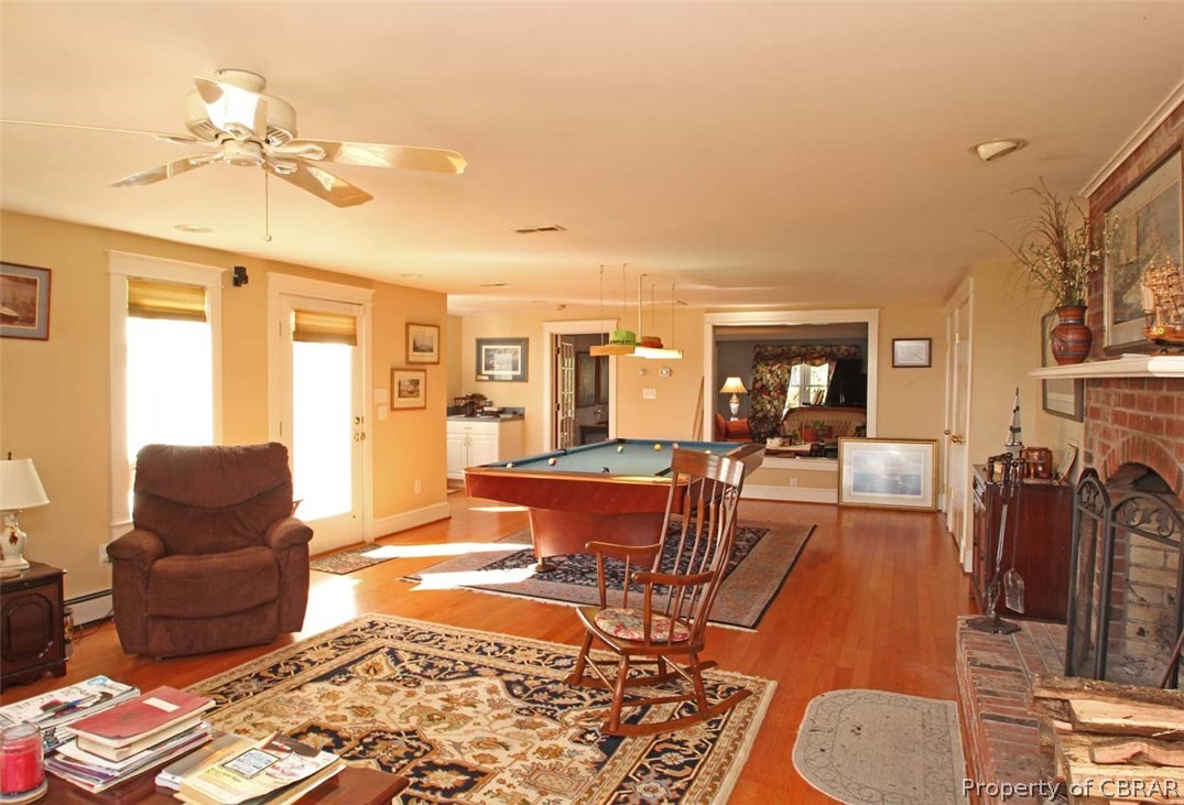 3974 Weems Road Weems, VA 22576 - Photo 13 of 37 River Room. Notice the open large window & door leading to the formal Living Room. Great flow to this home.