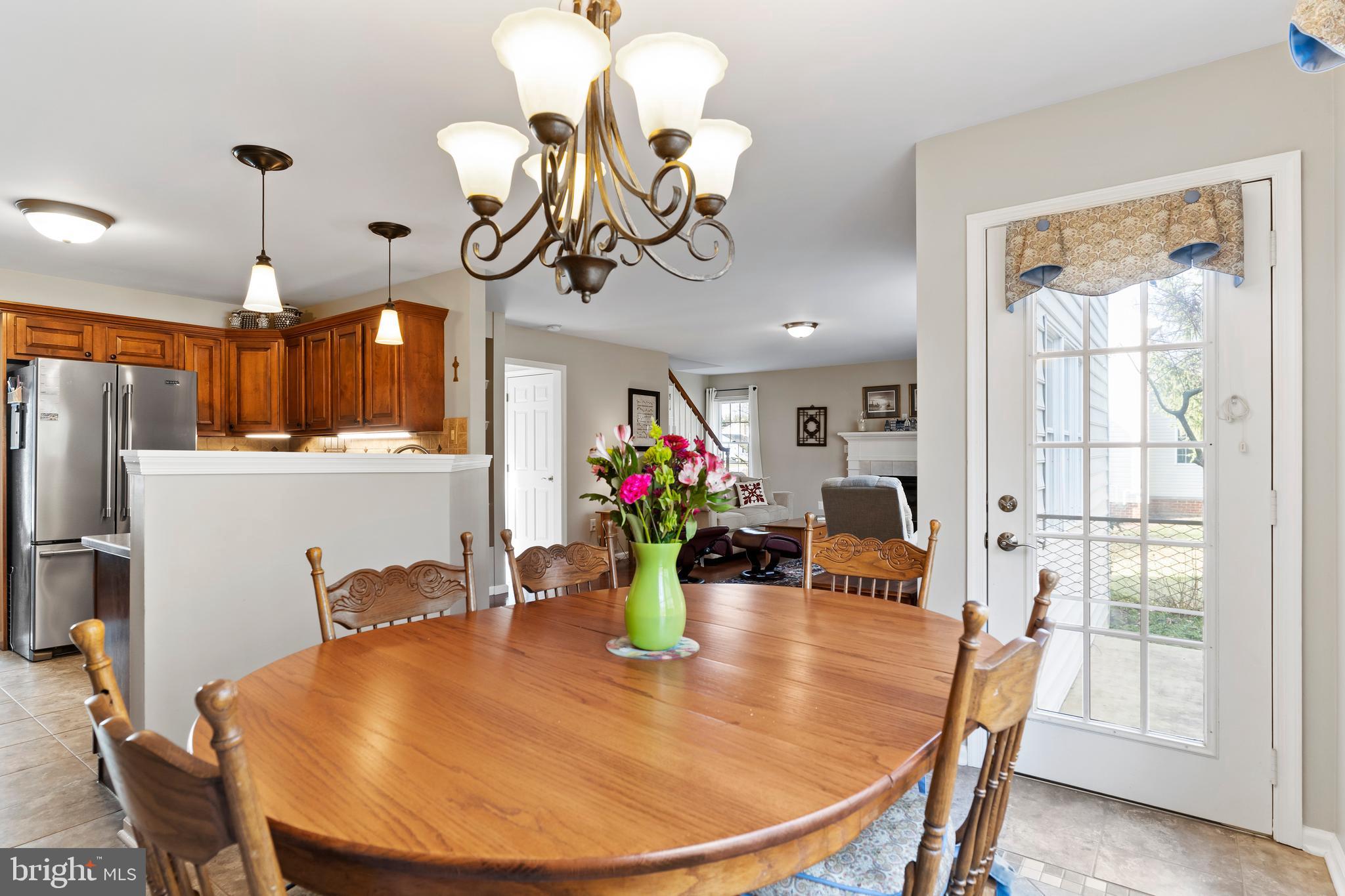 13 Todd Road Carlisle, PA 17013 - Photo 18 of 46 a view of a dining room with furniture wooden floor and chandelier