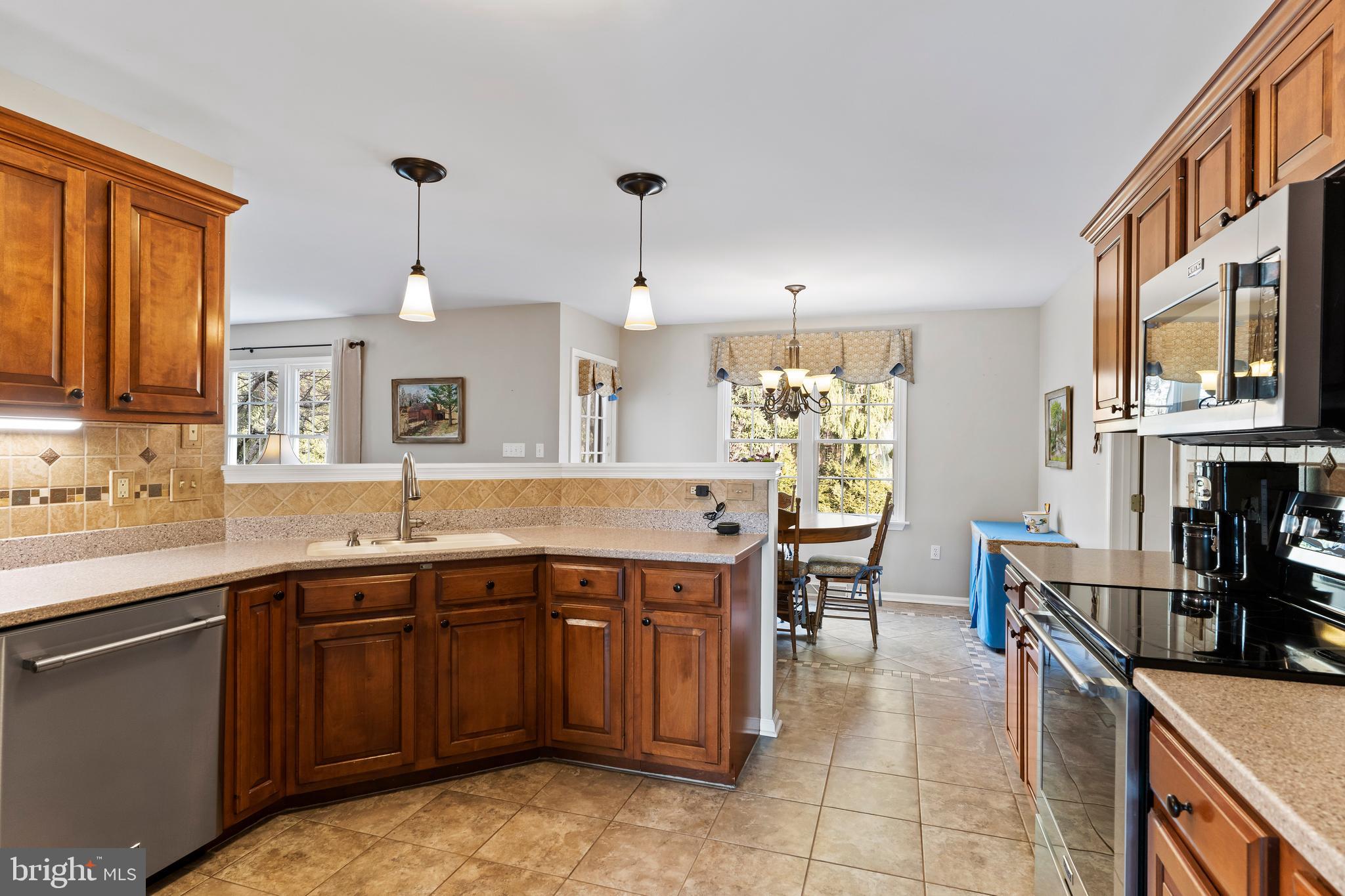 13 Todd Road Carlisle, PA 17013 - Photo 21 of 46 a kitchen with a sink counter top space appliances and cabinets
