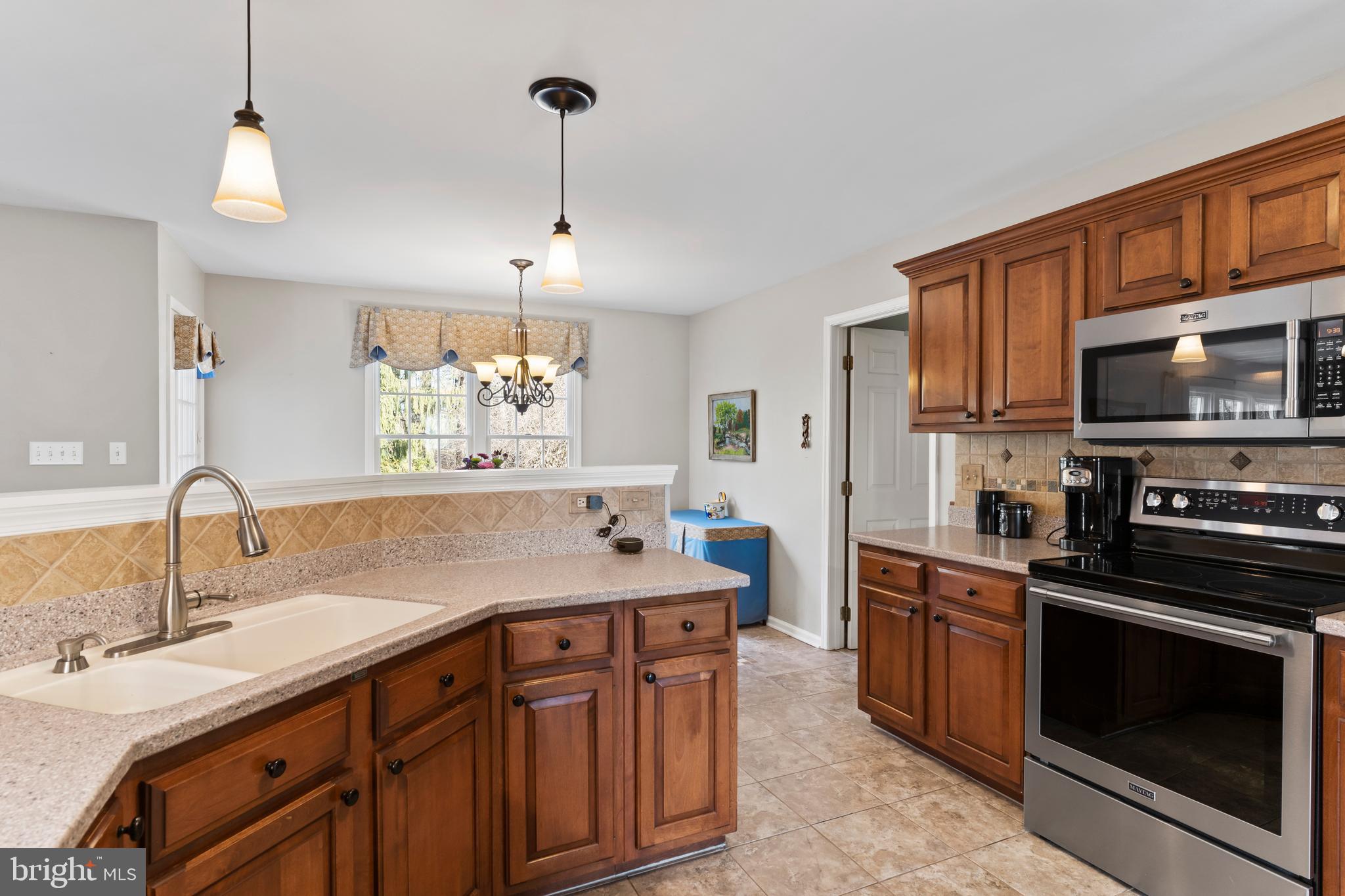 13 Todd Road Carlisle, PA 17013 - Photo 23 of 46 a kitchen with a sink stove and microwave