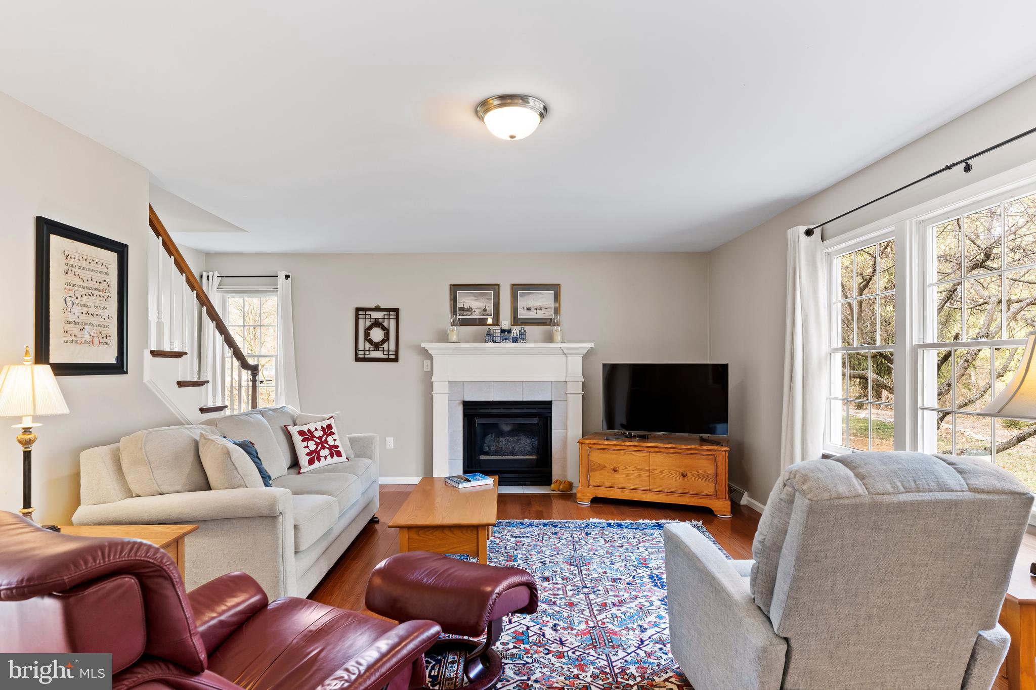 13 Todd Road Carlisle, PA 17013 - Photo 25 of 46 a living room with furniture flat screen tv and a fireplace
