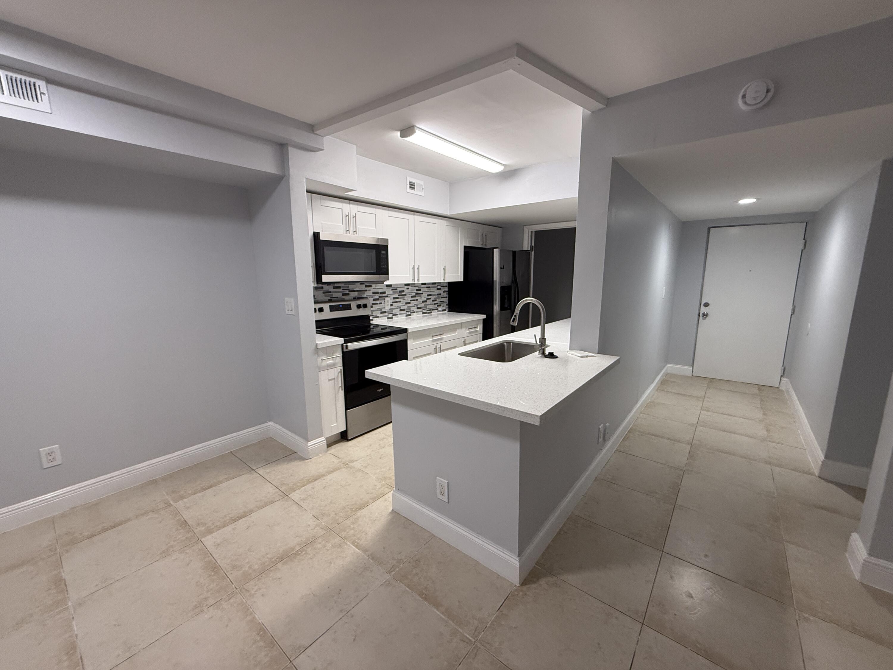 5760 Rock Island Road, Unit 309 Tamarac, FL 33319 - Photo 5 of 24 IMG_7310