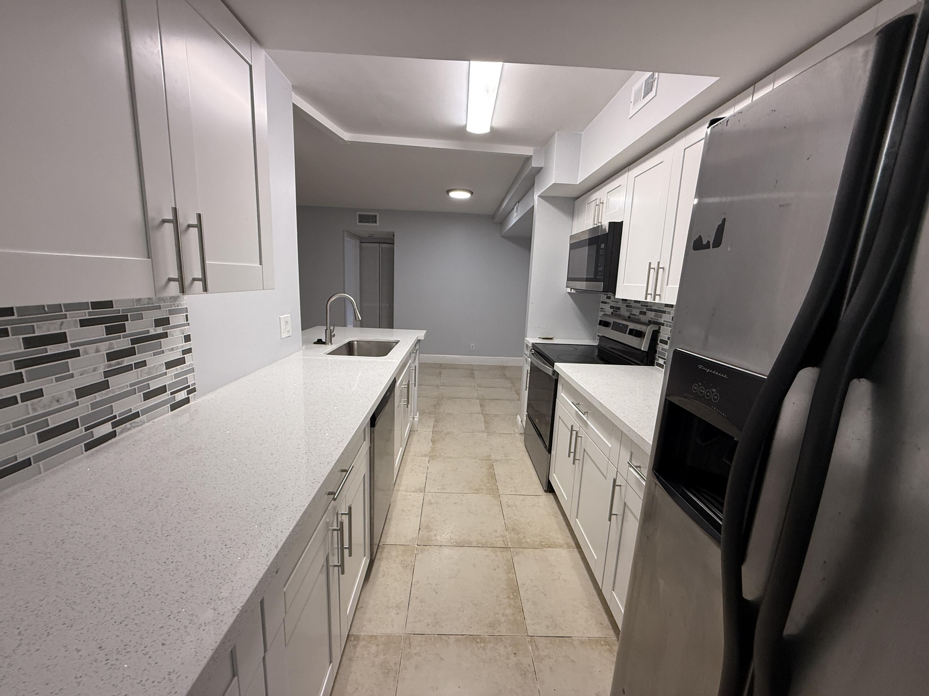 5760 Rock Island Road, Unit 309 Tamarac, FL 33319 - Photo 7 of 24 IMG_7312