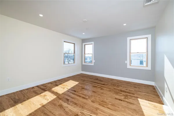 a view of an empty room and window