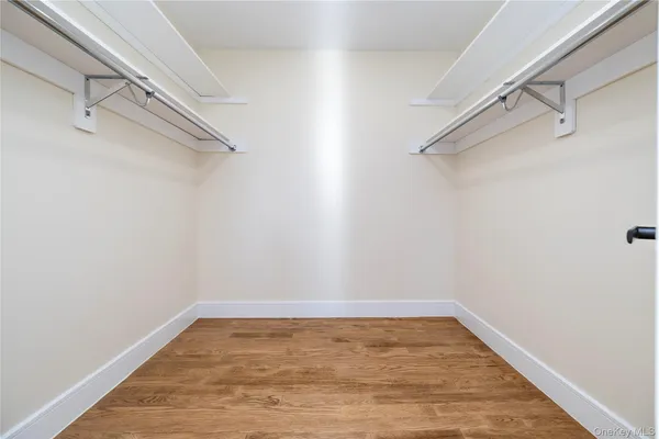 a view of a room with racks on the wall