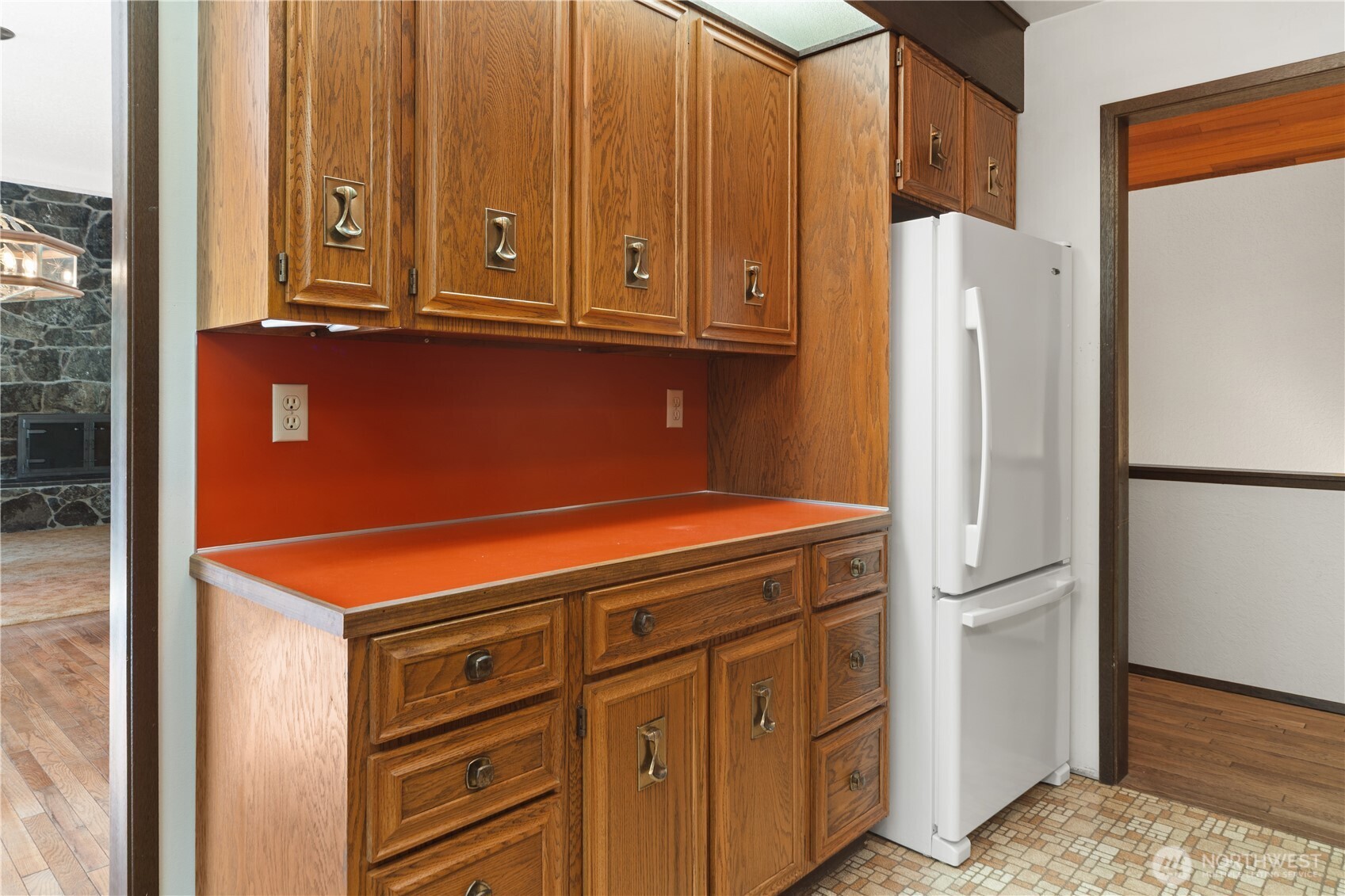 91 Drew Lane Port Ludlow, WA 98365 - Photo 13 of 38 a kitchen with stainless steel appliances a refrigerator and cabinets