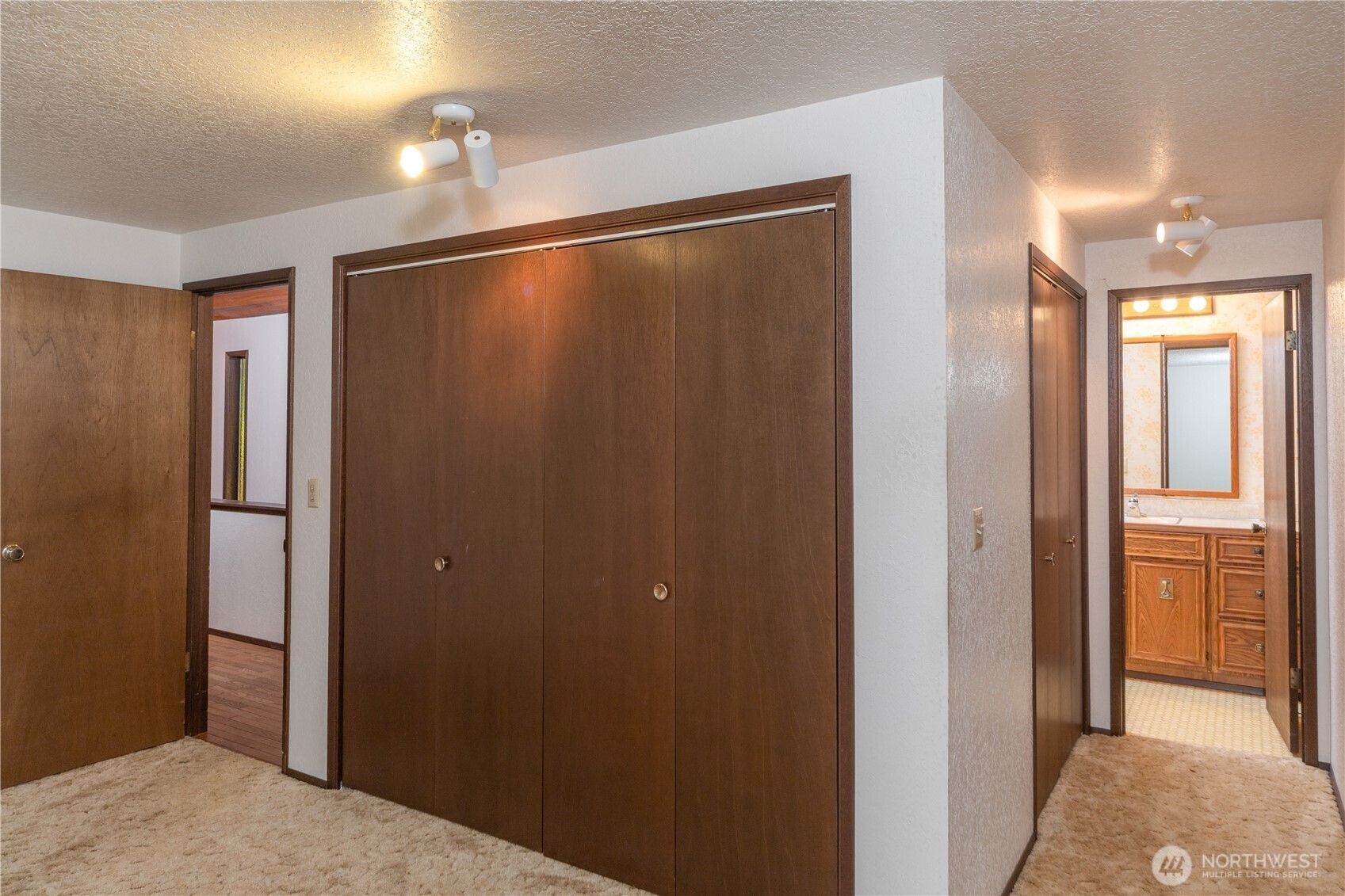 91 Drew Lane Port Ludlow, WA 98365 - Photo 17 of 38 a view of a hallway with closet area