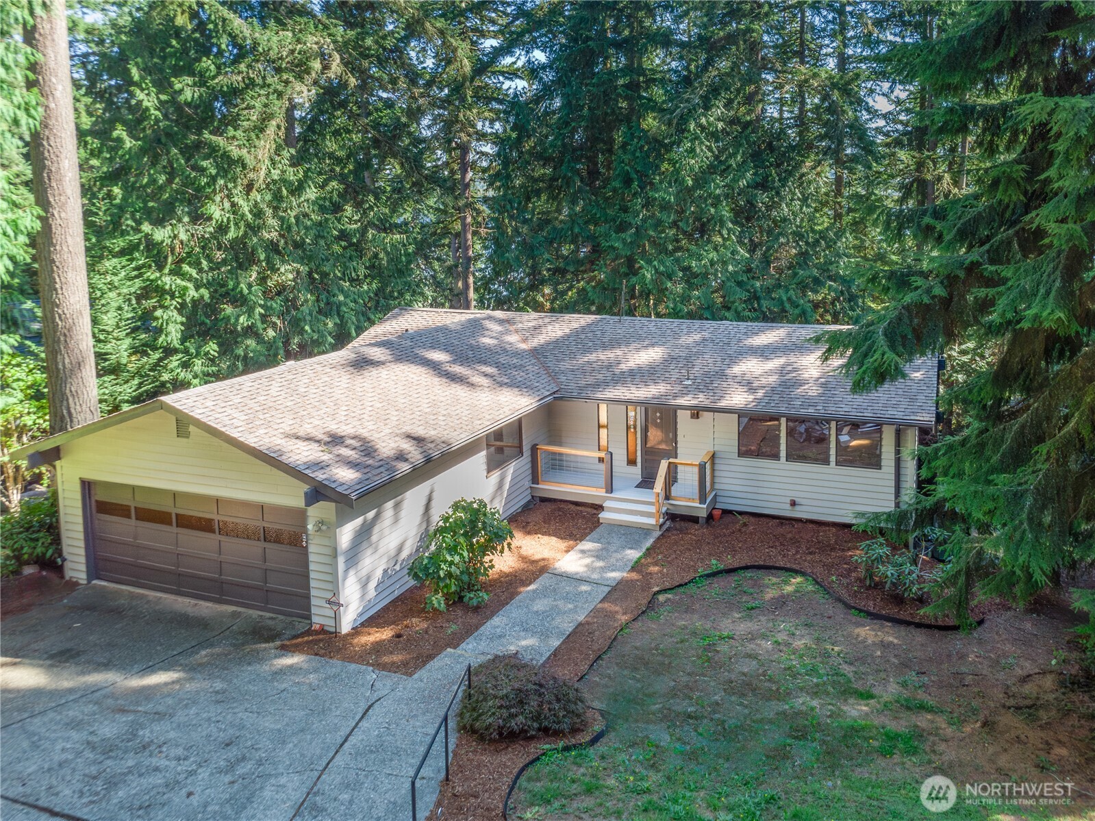 91 Drew Lane Port Ludlow, WA 98365 - Photo 2 of 38 an aerial view of a house with a yard