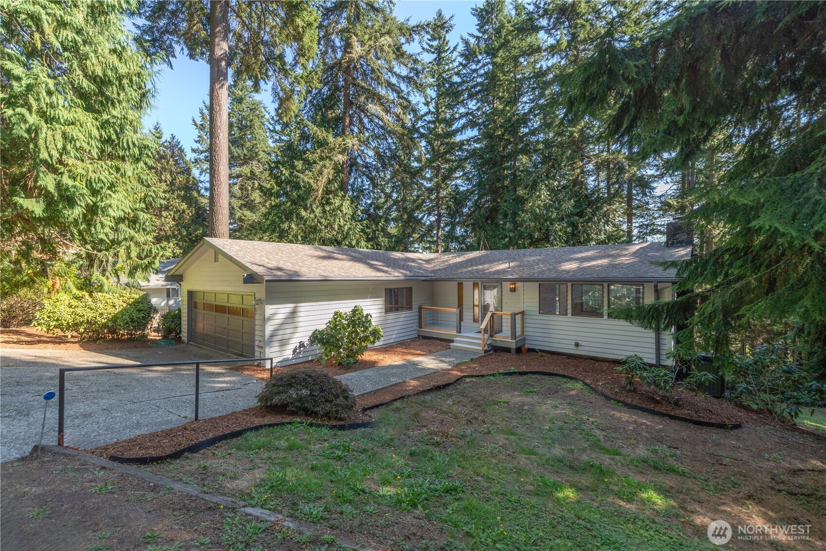 91 Drew Lane Port Ludlow, WA 98365 - Photo 3 of 38 front view of a house with a yard